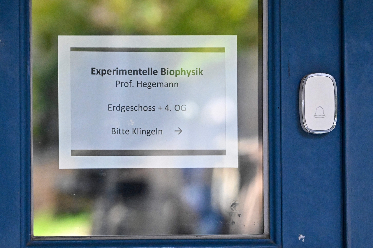 A sign bearing the name of German scientist Peter Hegemann is displayed at the entrance to his experimental biophysics department at Humboldt University in Berlin, Monday, after he is named a winner of the 2026 Nobel Prize in Physiology or Medicine. Hegemann shares the prize with US scientist Karl Deisseroth and German scientist Georg Nagel for their discoveries concerning light-gated ion channels and optogenetics. (AFP)