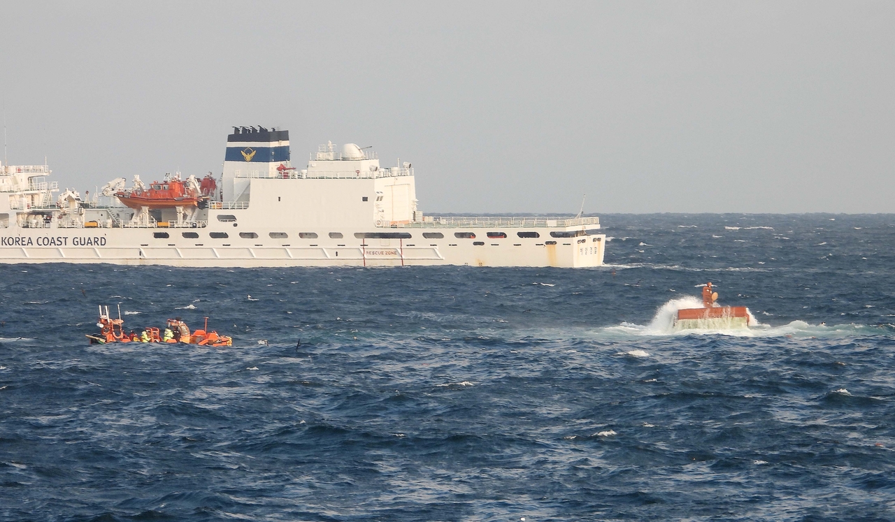 The Jeju Coast Guard on Monday conducts a search for two sailors that have been missing since a fishing boat capsized in waters off Chagwido Island, near Jeju Island. (Yonhap)