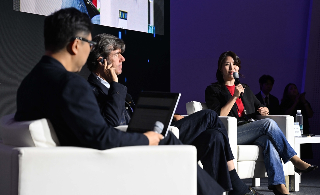 Yu Ji-won (right) speaks during a panel discussion at Herald Design Lounge 2026 at Dongdaemun Design Plaza in Seoul on Friday. (Lee Sang-sub/The Korea Herald)