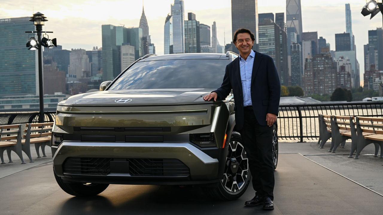 Hyundai Motor President and CEO Jose Munoz poses for a photo with the all-new Tucson at Sound River Studios in New York on Thursday. (Hyundai Motor)