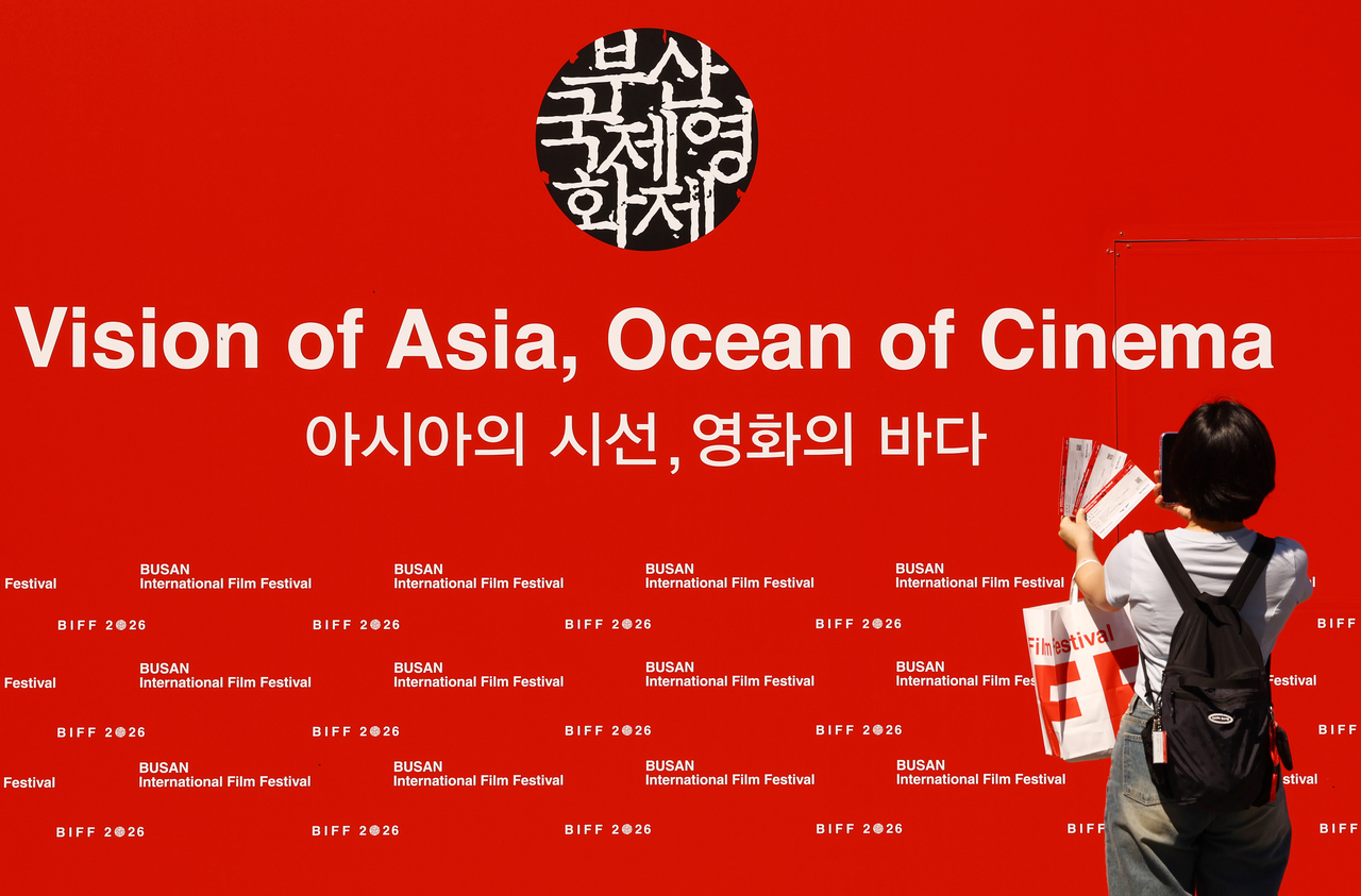 A visitor takes picture at the Busan Cinema Center. (Yonhap)