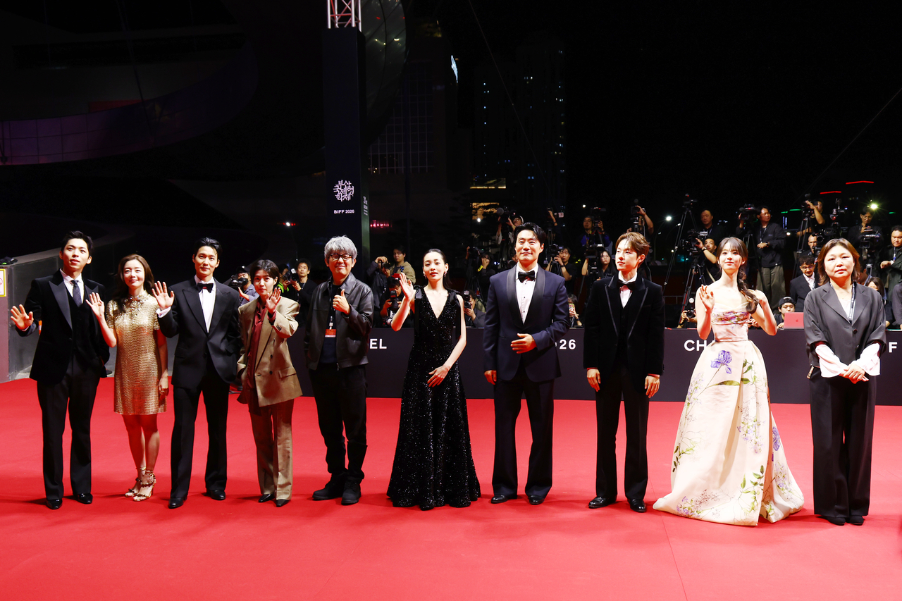 The cast and director of opening film "The Table: Day and Night" arrive on the red carpet