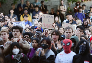 A crowd of students protests Cornell's response to gang rape complaint