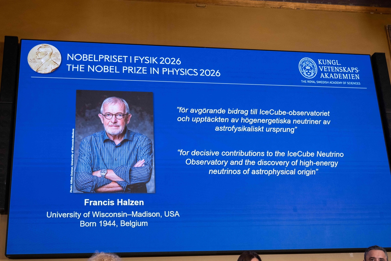 A photograph of Francis Halzen is displayed on a screen in Stockholm on Tuesday. (AFP-Yonhap)