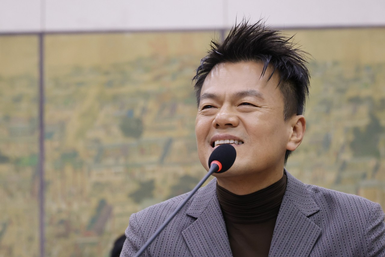 J. Y. Park, co-chair of the Popular Culture Exchange Committee, speaks at a parliamentary audit of the Ministry of Culture, Sports and Tourism on Wednesday explaining the background behind the planning of the global festival “Phenomenon.”  (Yonhap)