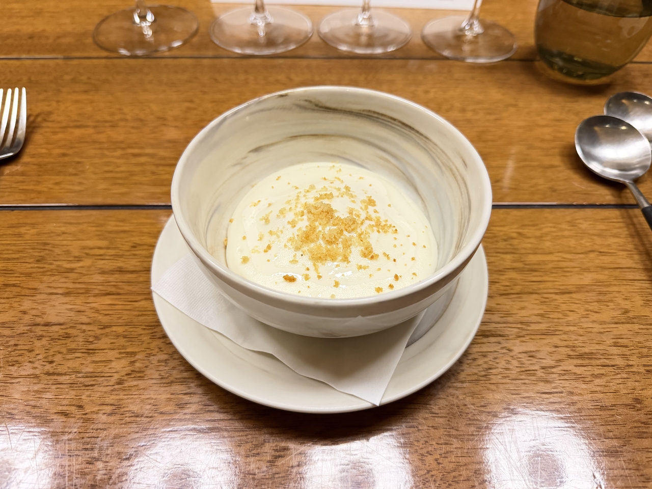 Sous-vide cage-free egg with smoked potato foam, Parmesan and hazelnut crumble (Hong Yoo/The Korea Herald)