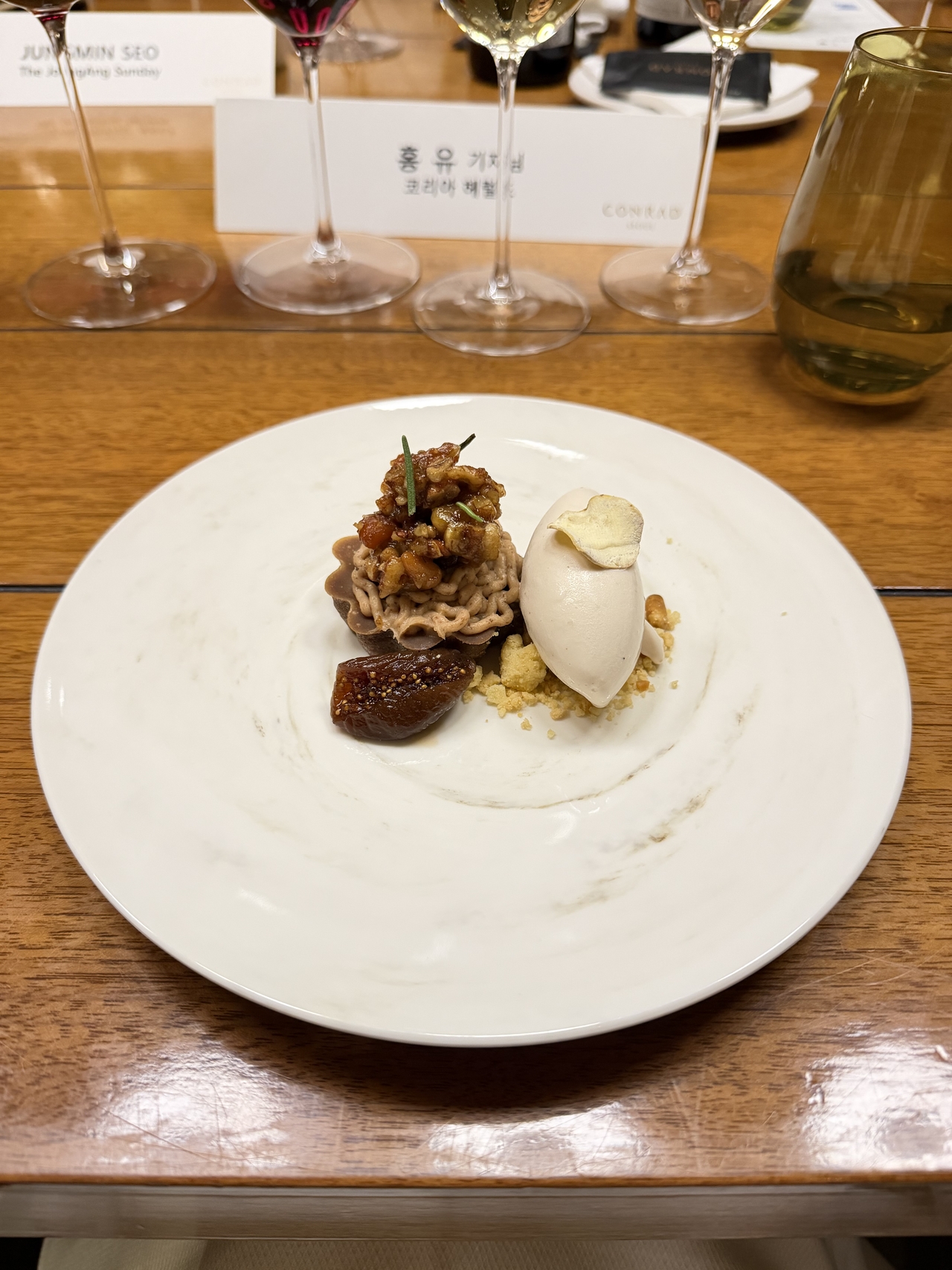 Vegan chestnut torta topped with chestnut cream and chestnut gelato, served with fig compote and pine nut crumble (Hong Yoo/The Korea Herald)