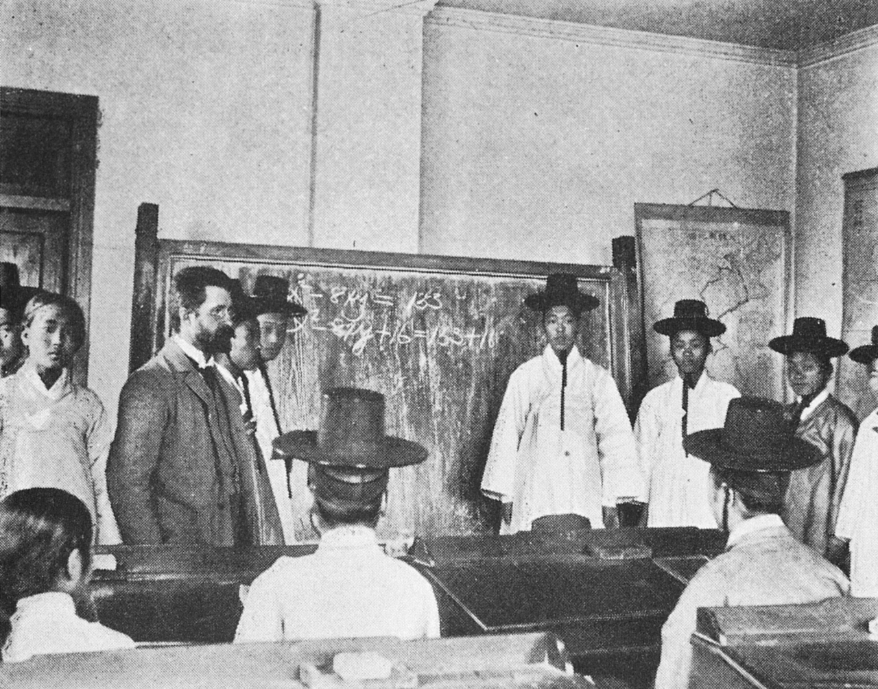 Homer B. Hulbert (left) teaches algebra at a government-run middle school. (Hulbert Memorial Society)