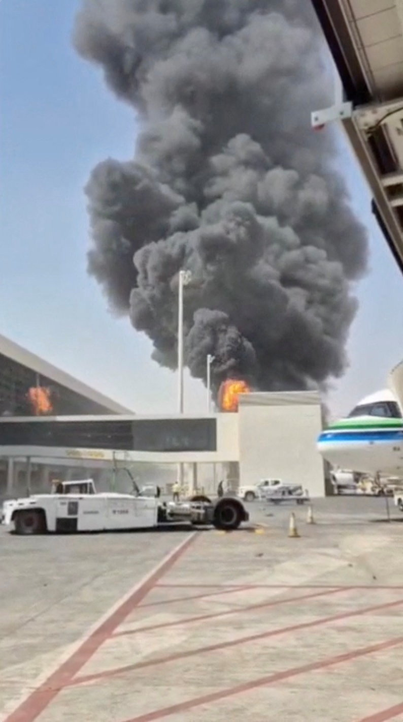 Flames and smoke rise from King Khalid International Airport in Riyadh, Saudi Arabia, on Thursday. Reuters verified the image, which circulated on social media, against satellite imagery and other sources. [Reuters-Yonhap. Redistribution and database storage prohibited]