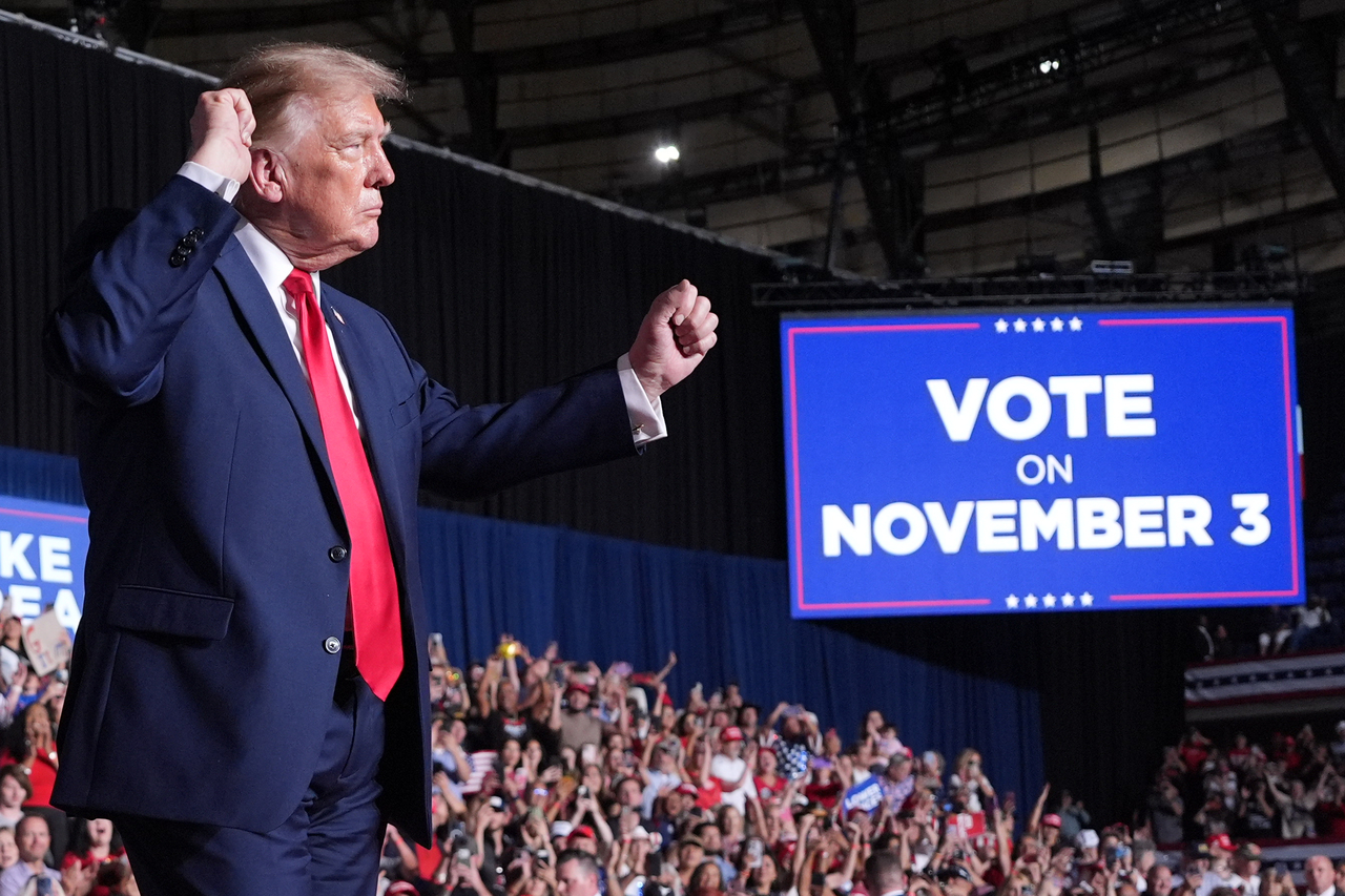 President Donald Trump dances at a campaign rally at Freeman Coliseum in San Antonio, Texas, on Wednesday. [AP]