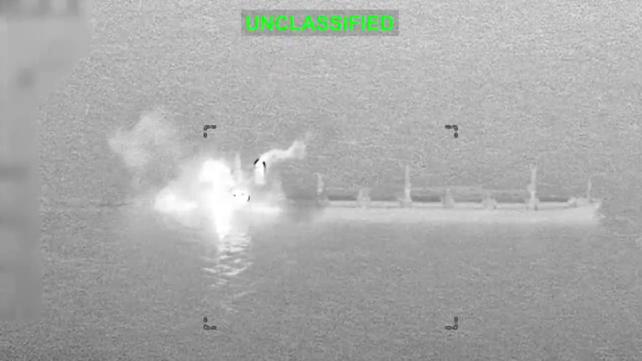 An explosion aboard a vessel attempting to break the blockade, as shown in footage released by US Central Command. [Reuters]