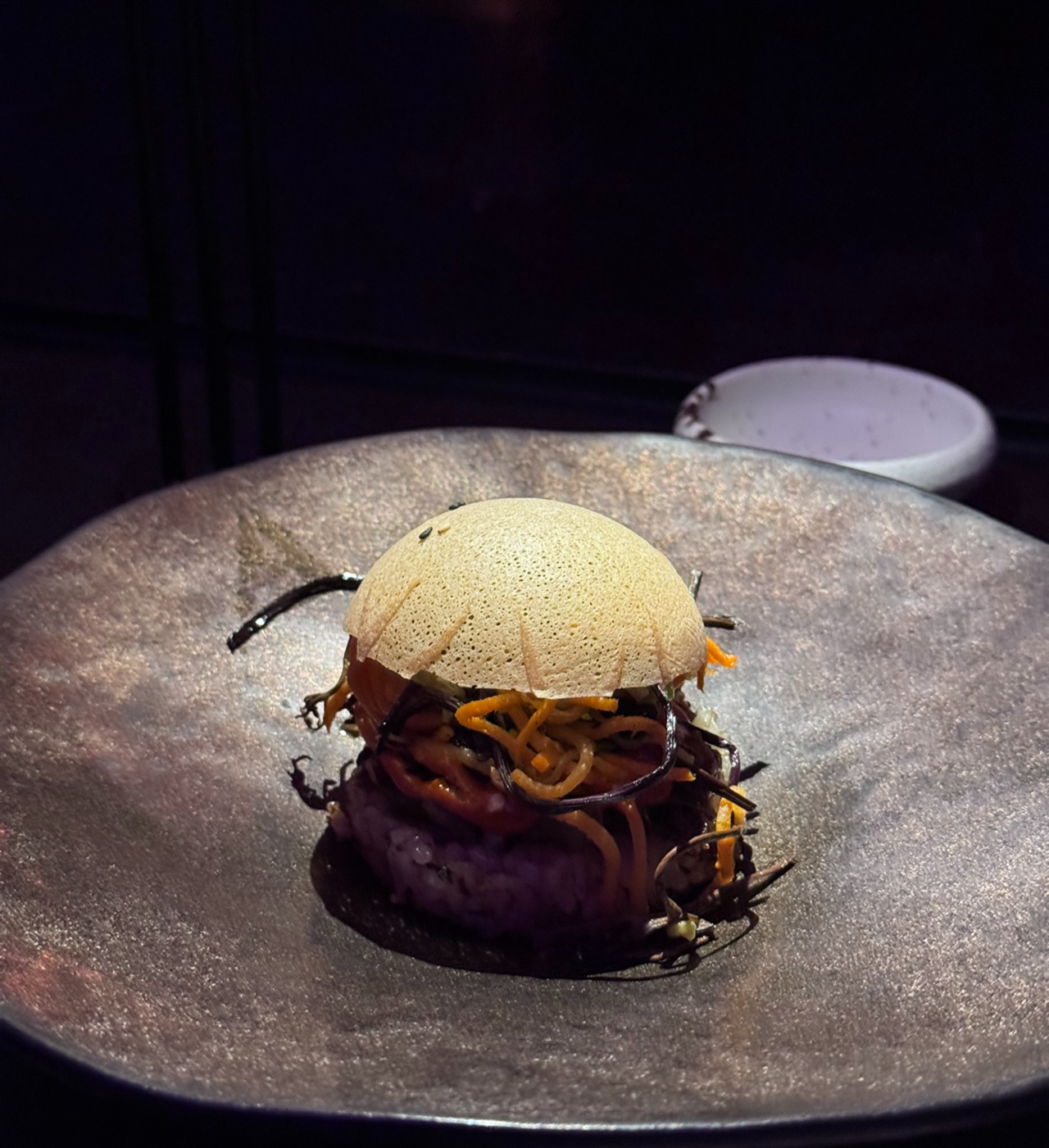 The Crown, a bibimbap-inspired course topped with a sesame tuile, at Burger King Korea's flagship in Seongsu, Seoul (No Kyung-min/The Korea Herald)