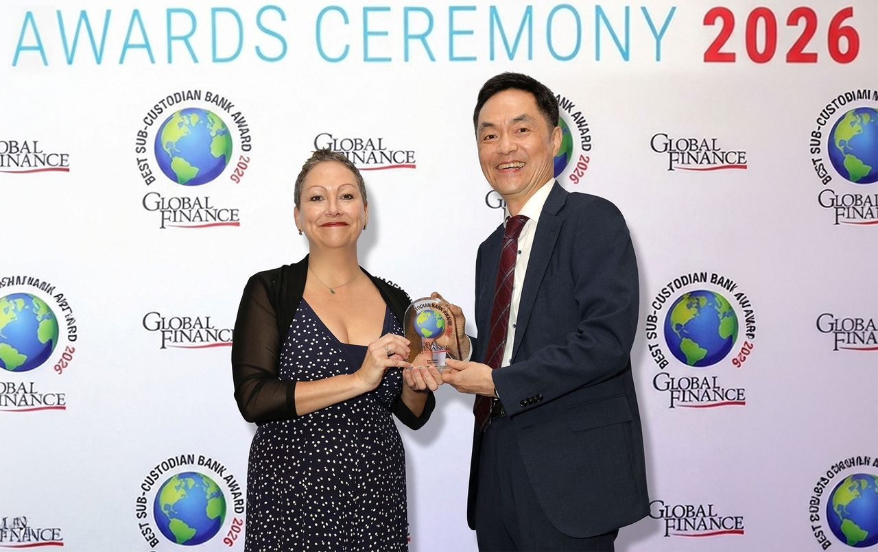 A Hana Bank employee poses for a photo at the awards ceremony held Sept. 29 (local time), where the bank was named the 2026 Best Sub-Custodian Bank in Korea by Global Finance magazine. [Hana Bank]