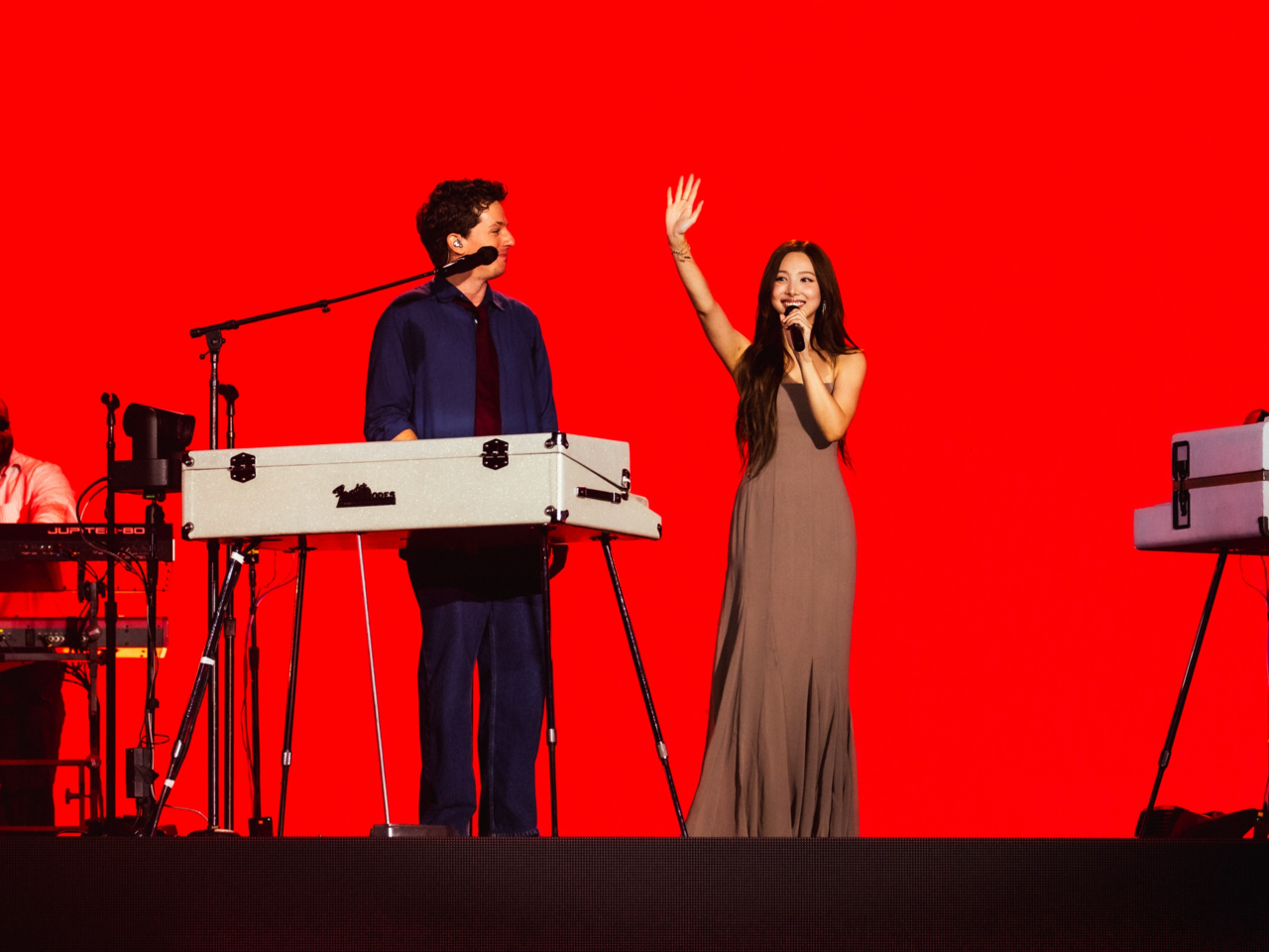 Twice member Nayeon (right) performs "We Don't Talk Anymore" with Charlie Puth during his "Whatever's Clever!" tour at Goyang Stadium in Goyang, Gyeonggi Province, Sunday. (Live Nation Korea)