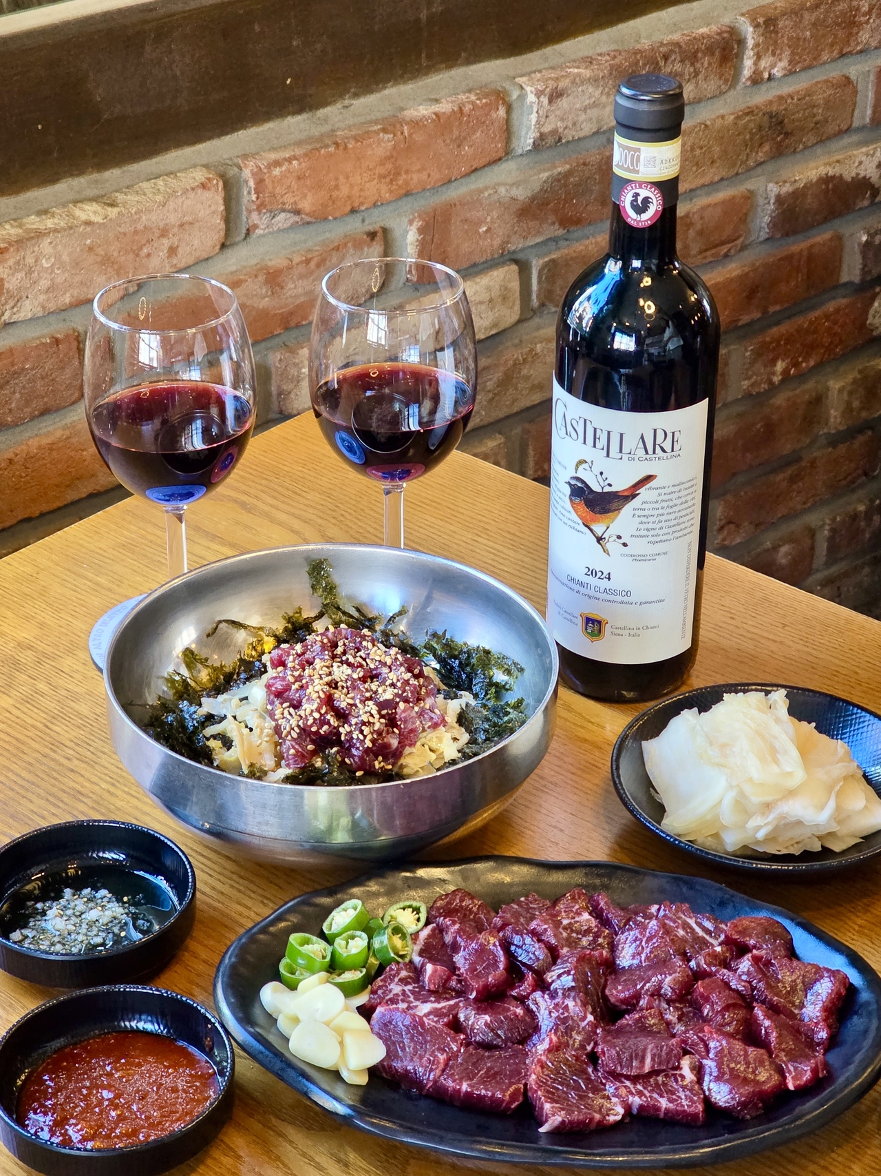 Raw marinated beef served alongside Chianti Classico, an Italian red wine [Foodion]
