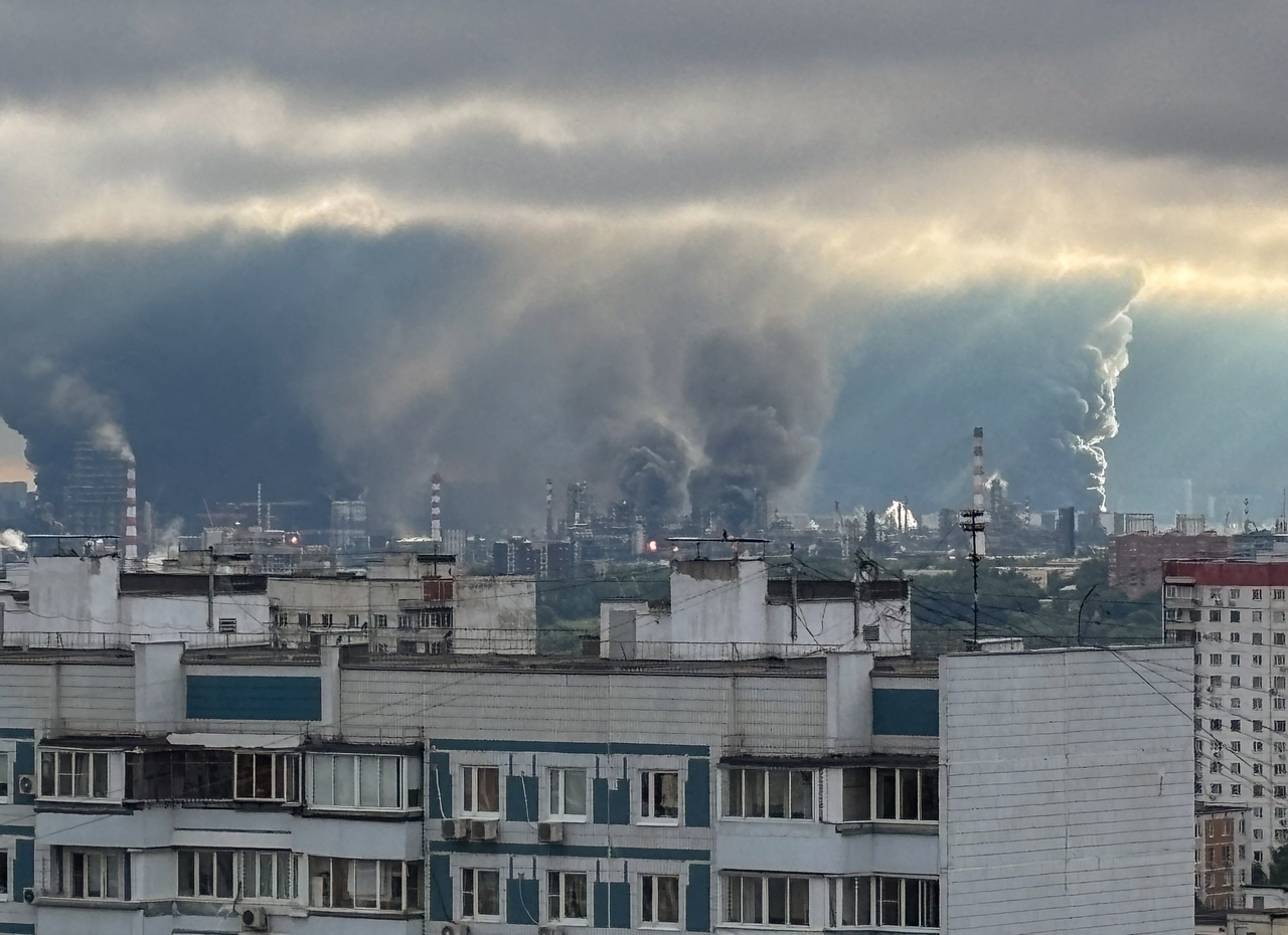 Thick plumes of smoke with flames rise from an oil refinery following what the authorities say is a Ukrainian drone strike in Moscow, June 18. (Reuters-Yonhap)