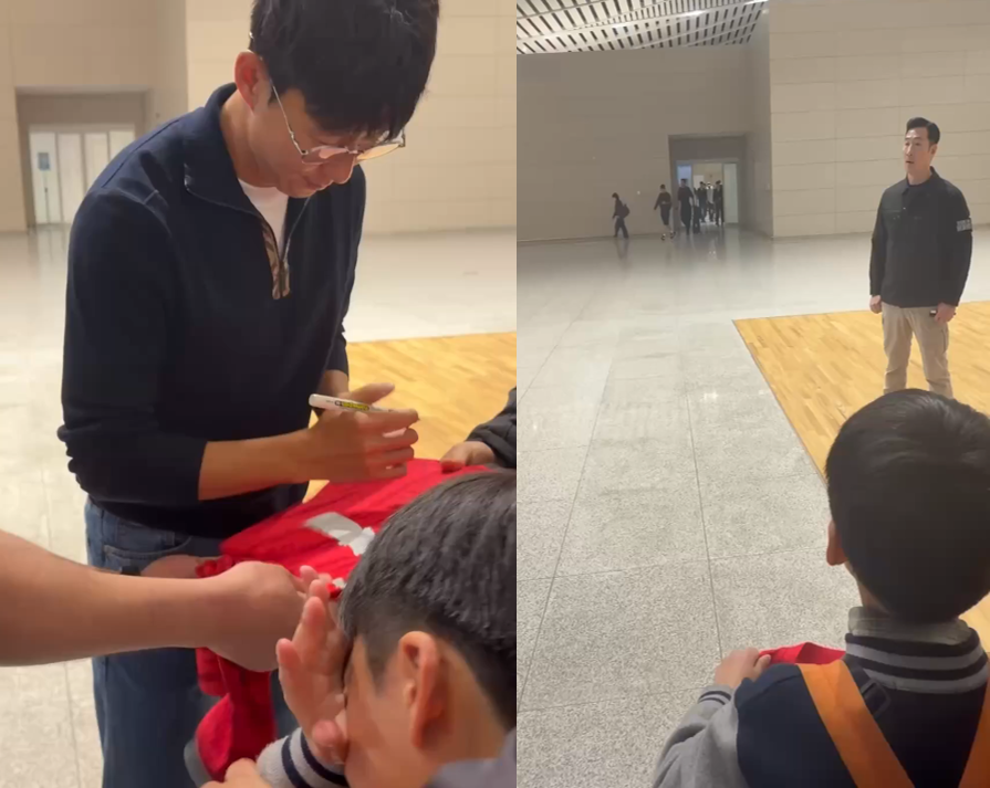 Son Heung-min approaches a crying young fan and signs his jersey at the departure area of Incheon Airport on Wednesday. (Aams_a_m on X)