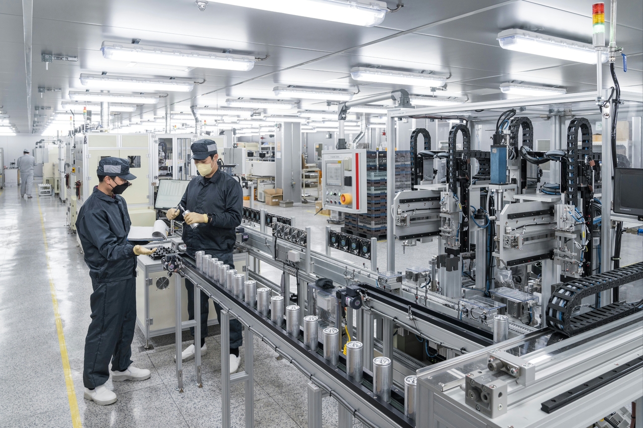 An LS Materials employee produces ultracapacitors at the company's facility. [LS Materials]