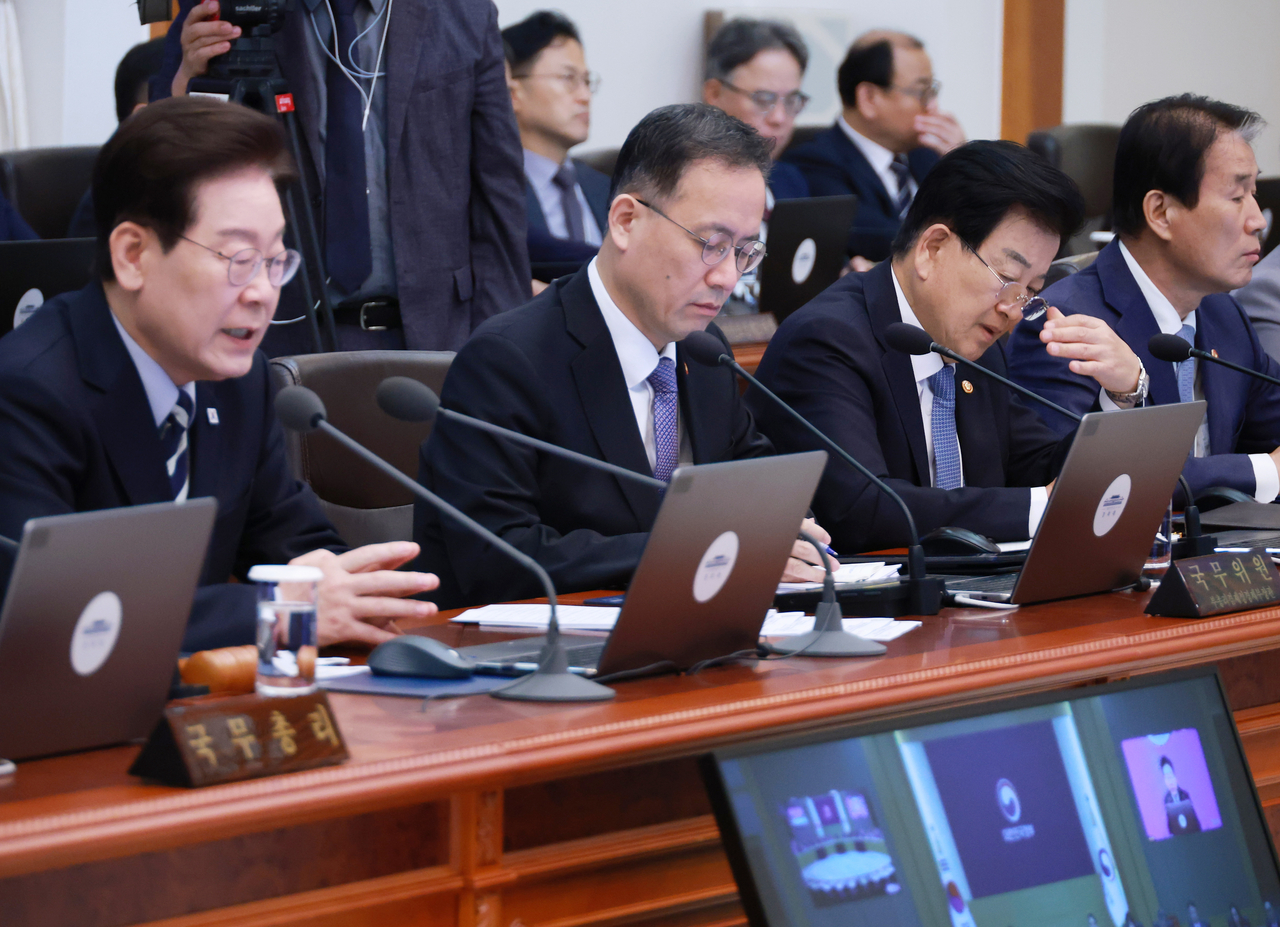 Unification Minister Chung Dong-young (second from right) attends a Cabinet meeting presided over by President Lee Jae Myung at Cheong Wa Dae on Tuesday. (Yonhap)