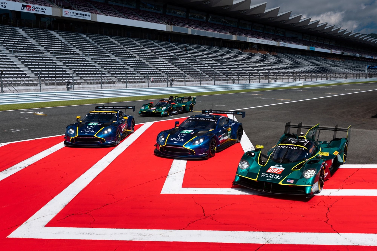 Two Aston Martin Valkyrie hypercars (green) and two Vantage GT3s (blue) line up side by side on a circuit ahead of Round 7 of the 2026 FIA World Endurance Championship, to be held in Barcelona, Spain, on Sunday. [Aston Martin]