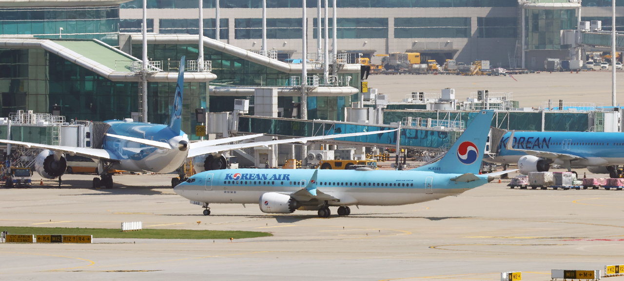 Korean Air aircraft sit parked at Incheon Airport on Sept. 3. (Newsis)