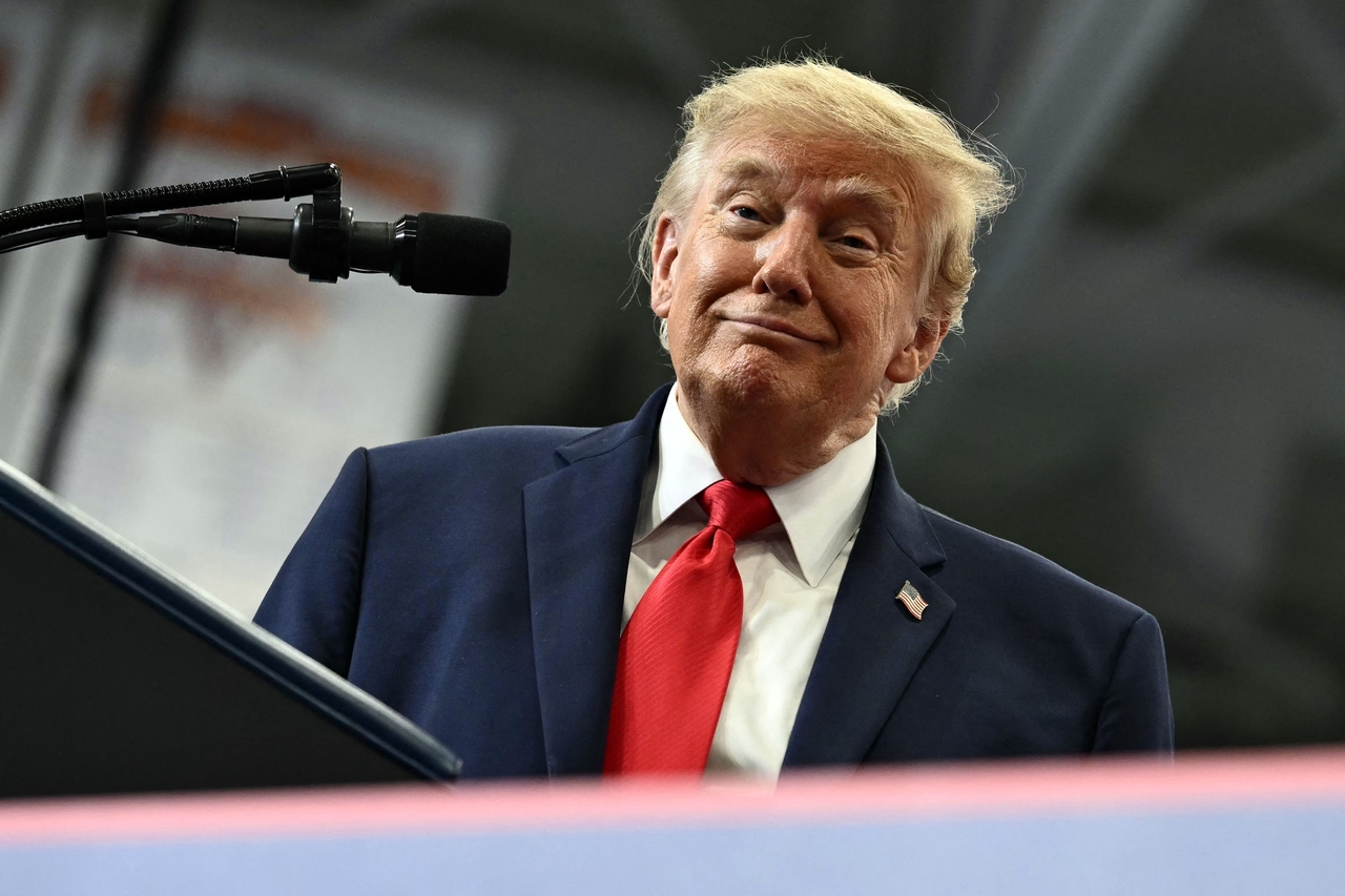 US President Donald Trump smiles at supporters after speaking at a campaign rally at the Curtis D. Menard Memorial Sports Center in Wasilla, Alaska, on Tuesday. [AFP]