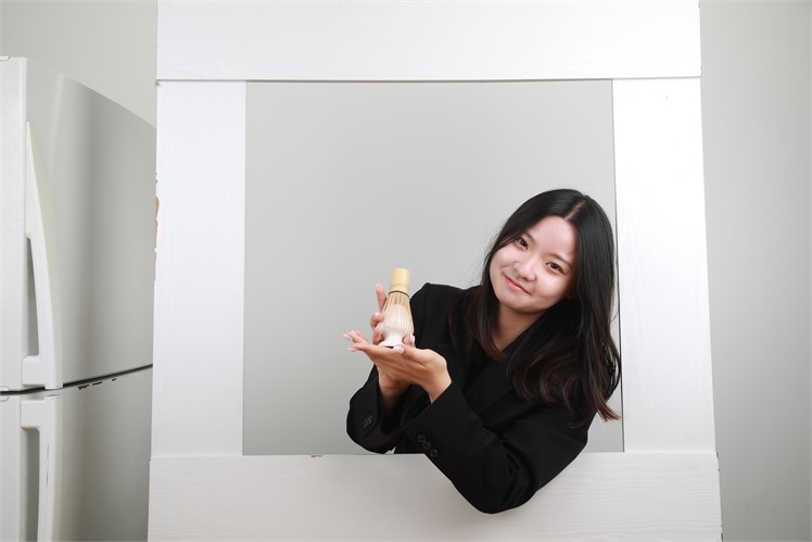 Cho Seung-ha, CEO of Dagyeok, holds up a chasen — a bamboo whisk used to prepare matcha. [Dagyeok]