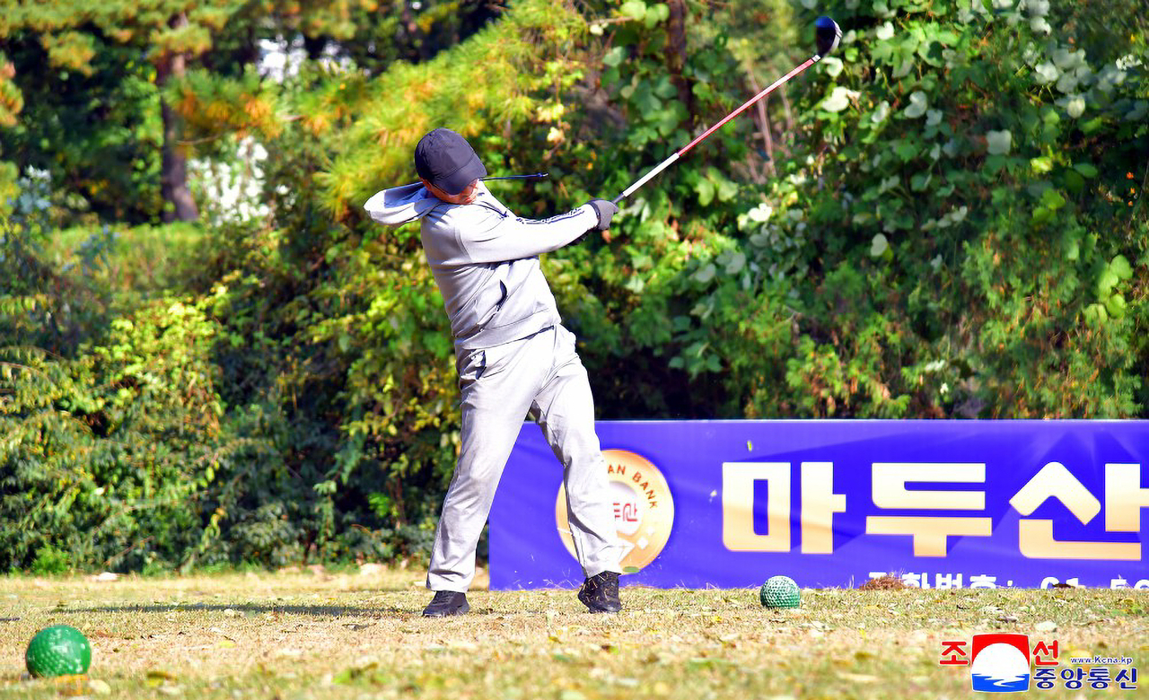 A man takes a full swing at the Pyongyang Golf Course in Pyongyang in this photo released Friday. (KCNA via Yonhap)