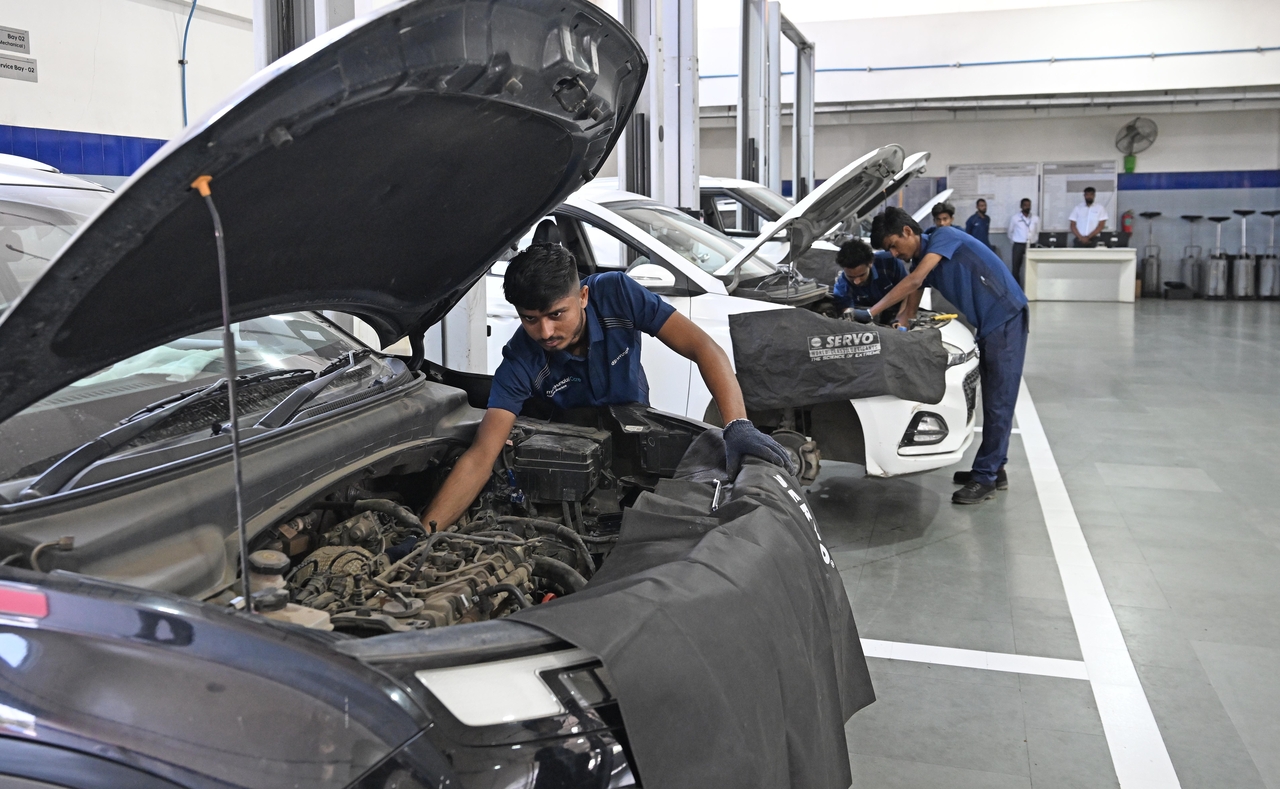 A technician works on a vehicle at the Kundan Hyundai service center in Pune, India, Thursday. (Hyundai Motor Group)