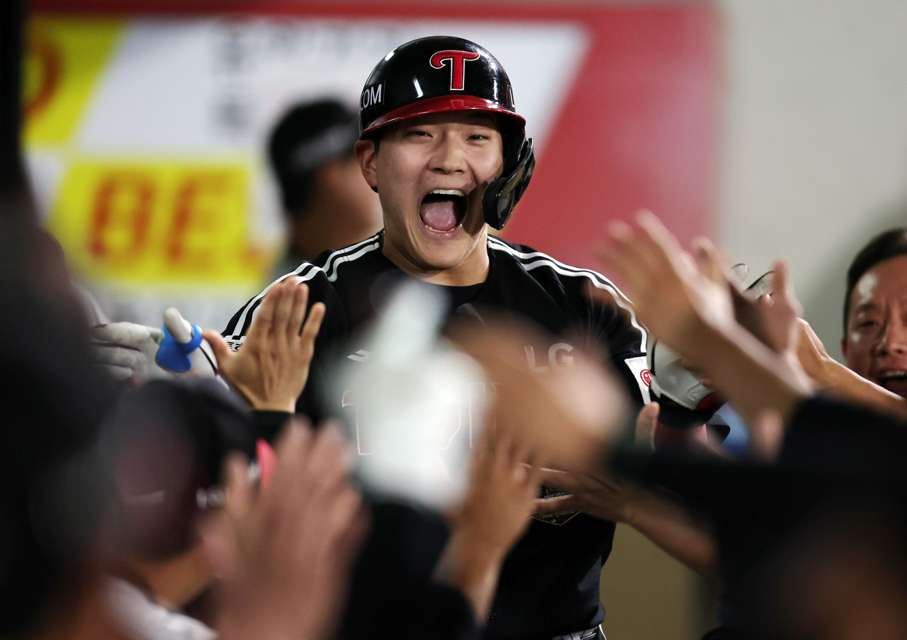 Moon Jeong-bin of the LG Twins celebrates after hitting a solo home run against the Kia Tigers during the clubs' Korea Baseball Organization regular-season game at Gwangju-Kia Champions Field in the southwestern city of Gwangju on Monday. (Yonhap)