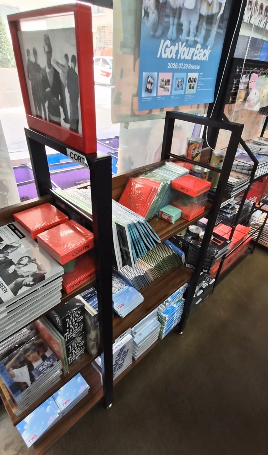 Albums by popular K-pop groups, including Cortis, are on display at K-pop Shop on Thursday. (Choi Jae-hee / The Korea Herald)