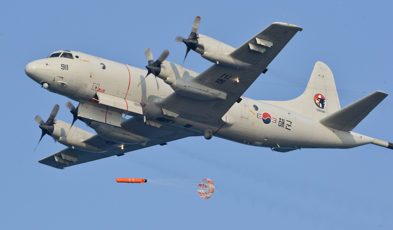The South Korean Navy's P-3CK maritime patrol aircraft are scheduled to be retired starting in 2030. A P-3 maritime patrol aircraft drops a sonobuoy during operations. (Navy)