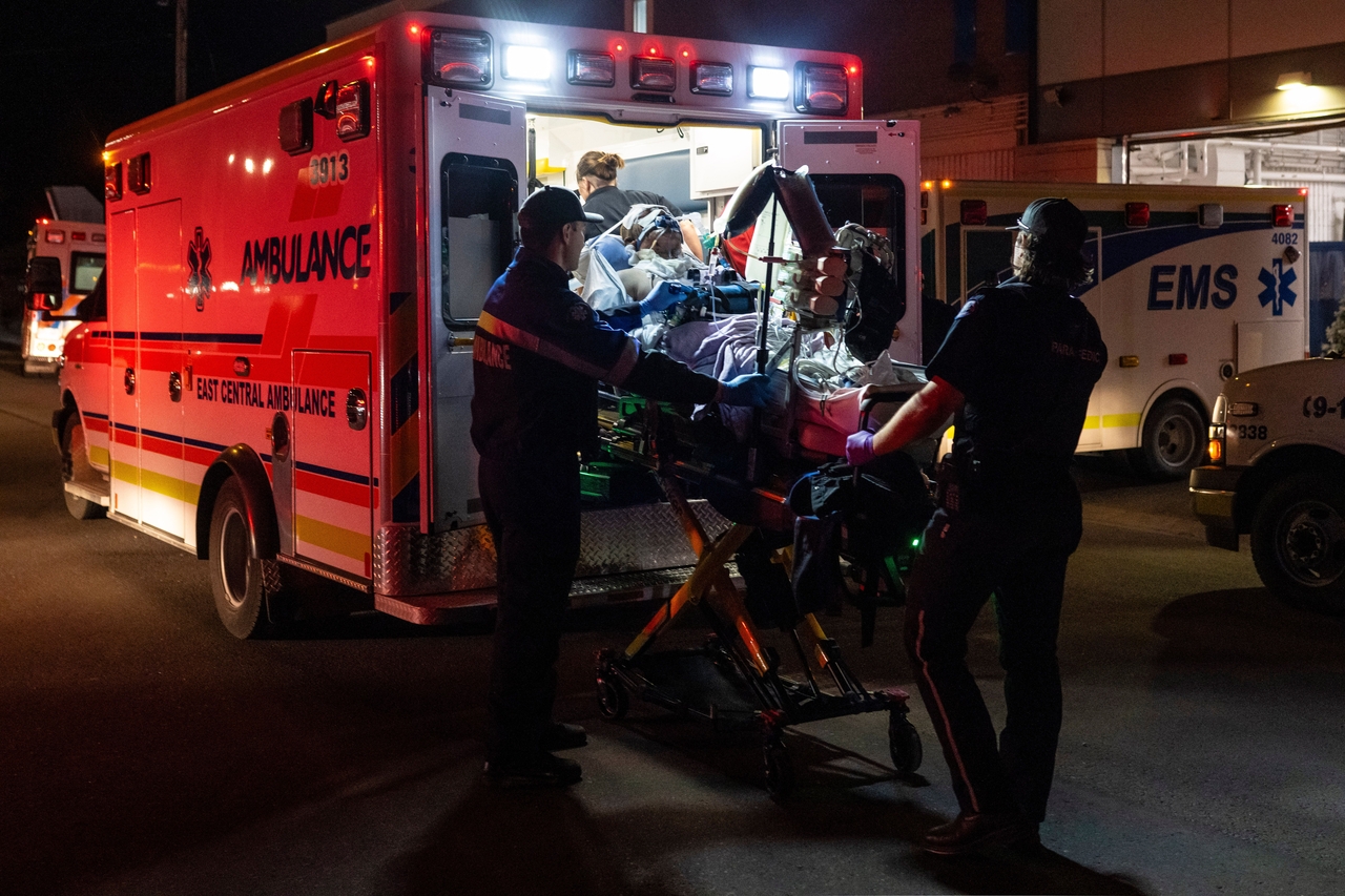 Paramedics load an injured person into an ambulance at the Wainwright Health Center in Wainwright, Alberta, Canada, Saturday. (AP-Yonhap)