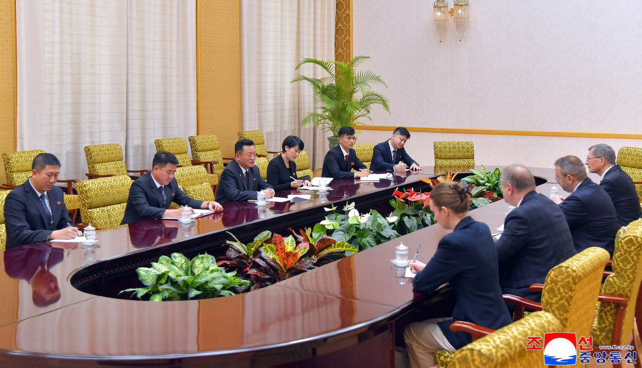 This file photo, carried by North Korea's official Korean Central News Agency on Sept. 30, shows a North Korean delegation, led by Education Minister Ri Yong-chol, meeting with Konstantin Mogilevski, Russia's vice minister of science and higher education, in Pyongyang the previous day. (Yonhap)