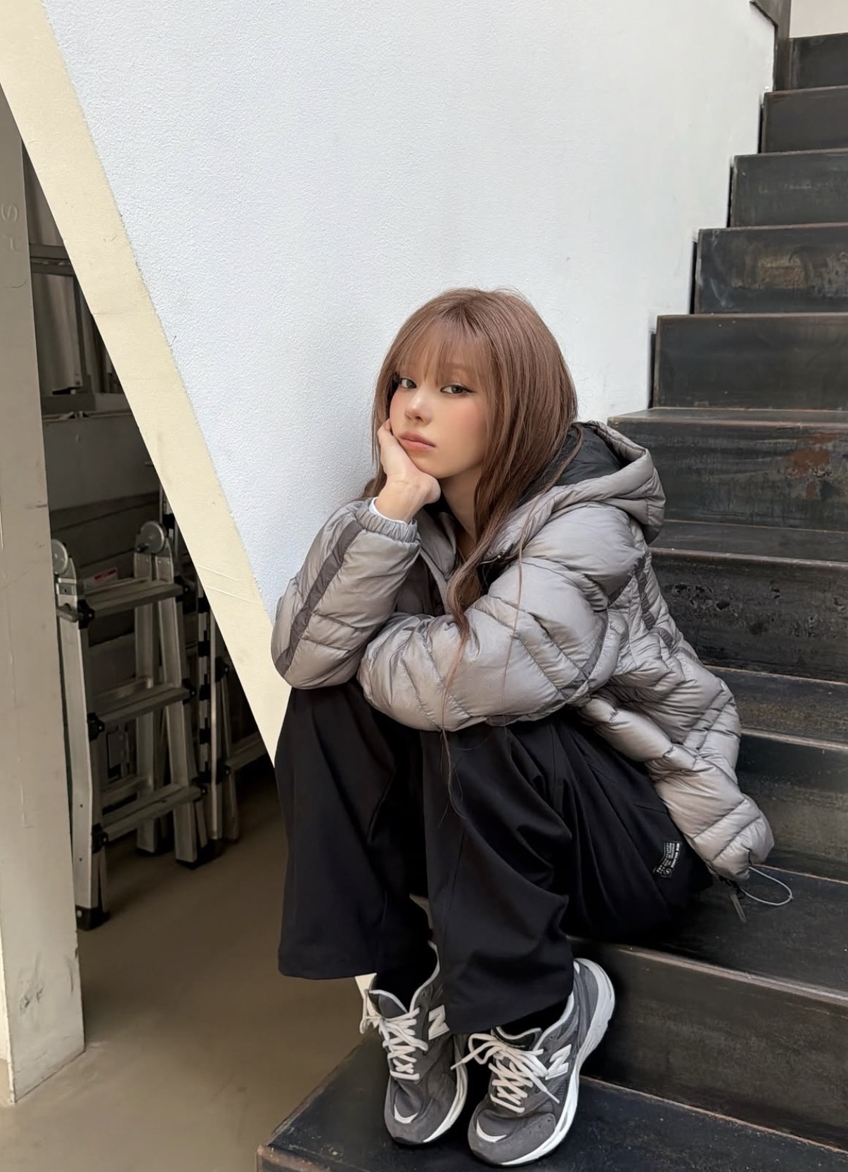 Winter of aespa wearing New Balance's Flying 77 Superlight Hooded Lightweight Goose Down jacket (Instagram)