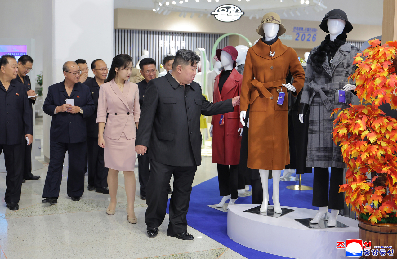 North Korean leader Kim Jong-un tours a light-industry clothing and footwear exhibition themed "A Fever for New Product Development and Quality Improvement" with his daughter Kim Ju-ae and wife Ri Sol-ju on Monday, KCNA reported Tuesday. [Yonhap — redistribution prohibited]