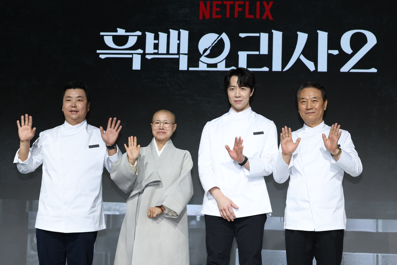 Chefs Jeong Ho-yeong (from left), Seonjae Sunim, Son Jong-won and Hu Deok-juk pose at a press conference for Culinary Class Wars Season 2, held at JW Marriott Dongdaemun Square Seoul in Jongno-gu, Seoul, on Sept. 17. [Yonhap]