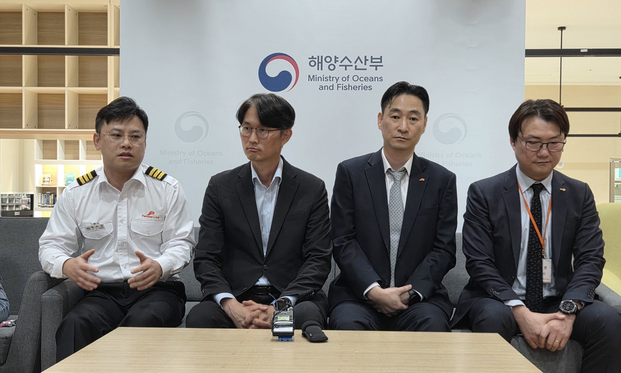 Participants in South Korea’s Arctic shipping trial discuss their experiences aboard the Panstar Acro during a press briefing at the Ministry of Oceans and Fisheries in Busan on Thursday. (Oceans Ministry)