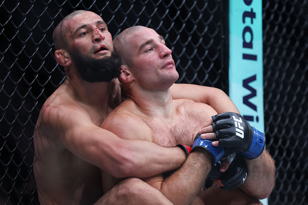 'I won't let go.' Chimaev controls Strickland from behind after taking him to the ground during their fight. [Getty Images]