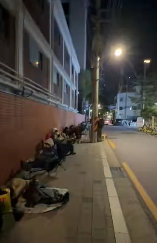 People wait overnight ahead of the opening of the first Seoul pop-up store for Justin Bieber's fashion brand Skylrk in Seongsu-dong, Seoul,  early Thursday morning. (Threads)