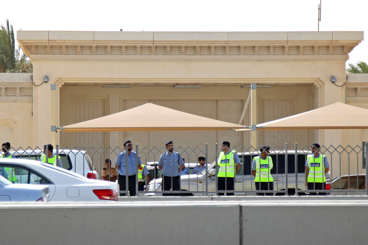 Qatari police stand guard outside the US Embassy in Doha, Qatar. [AP]