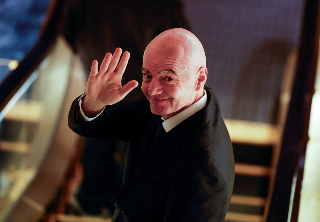 FIFA president Gianni Infantino gestures to reporters as he leaves from AFC’s extraordinary congress in Tokyo, Friday.   (Reuters-Yonhap)