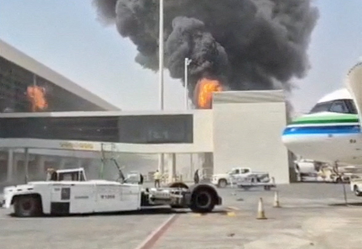 Smoke and flames rise from King Khalid International Airport in Riyadh, Saudi Arabia, following a Houthi attack earlier this month. Photo captured from social media footage. [REUTERS]
