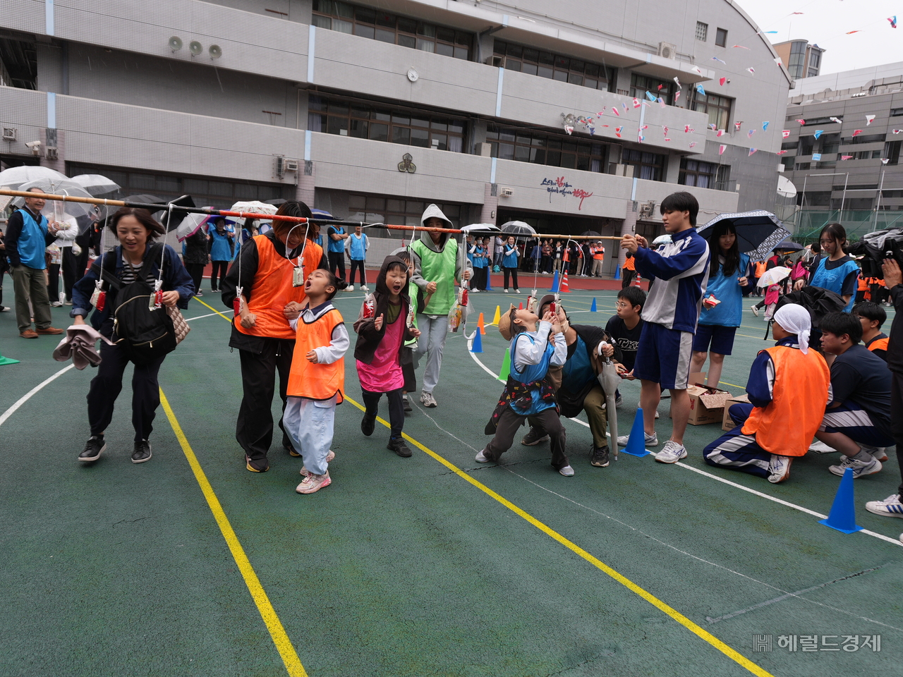 Participants of all ages take part in a relay snack-eating race