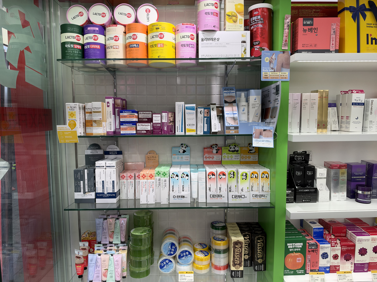 Skin repair creams, acne treatments and dietary supplements are displayed at a pharmacy in Myeong-dong, Seoul. (Park Jun-hee/The Korea Herald)