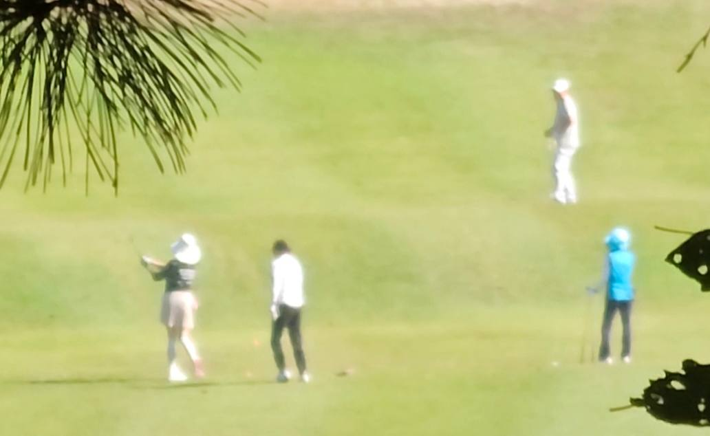 A photo released by People Power Party lawmaker Ju Jin-woo, who claims it shows Kim Hye-kyung (left, presumed) playing golf at Taereung Country Club on Tuesday with a professional golfer. [Captured from Ju Jin-woo's Facebook]