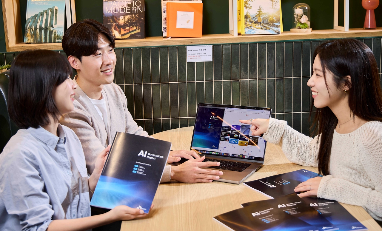 SK Telecom employees introduce the company's AI governance report. [SK Telecom]