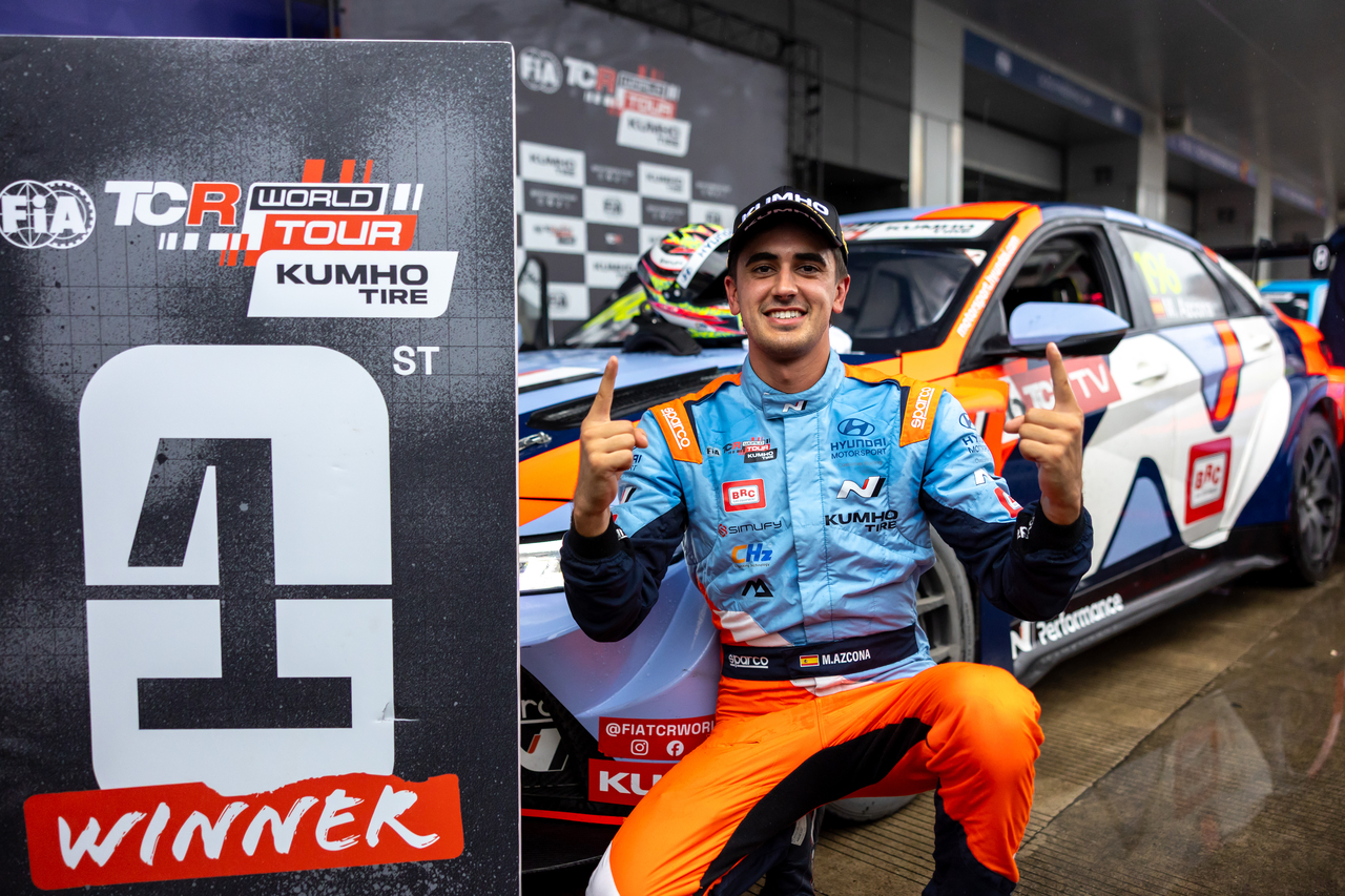 Mikel Azcona poses in front of his car after winning Round 7 of the 2026 TCR World Tour. [Hyundai Motor]