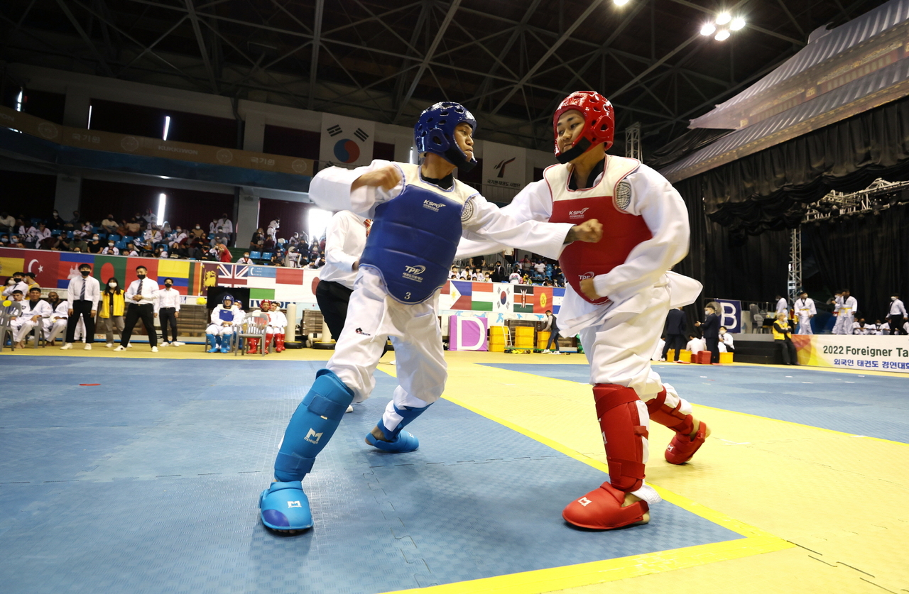 Participants perform taekwondo at the 2025 Foreigner Taekwondo Exhibition Festival on Oct. 30, 2025. (Gangnam-gu Office)