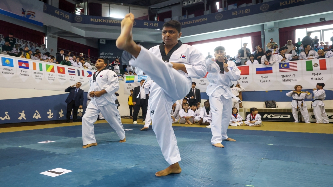 Participants perform taekwondo at the 2025 Foreigner Taekwondo Exhibition Festival on Oct. 30, 2025. (Gangnam-gu Office)